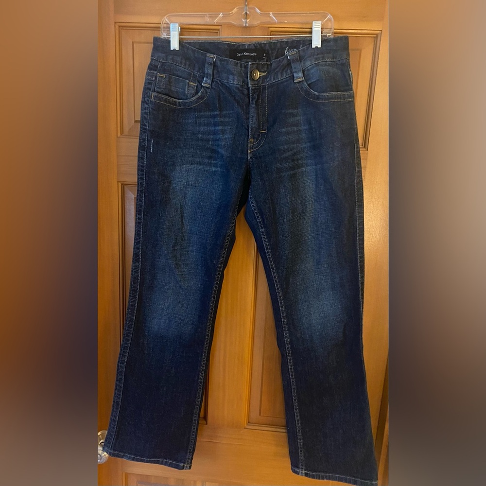 Calvin Klein Women’s Dark Blue Jeans Lean Bootcut.  Size 12. Like new. Cute fit.